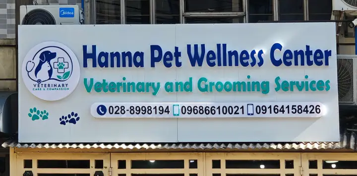 The front of Hanna Pet Wellness Center, with its white sign and three phone numbers