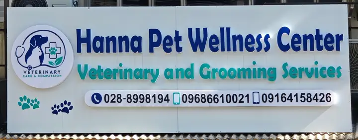 Our white sign: Hanna Pet Wellness Center, Veterinary and Grooming Services